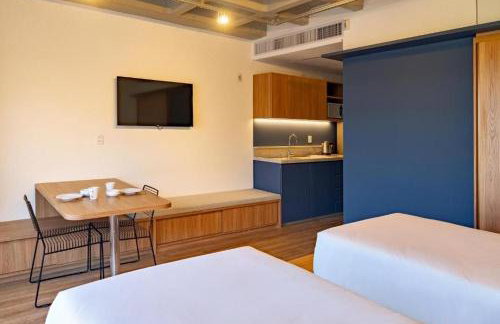 Atrium Studios by Xtay - Studio moderno em Pedra Branca - Caminhe até o Centro Empresarial e Unisul - Foto 59