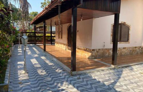 Ampla casa em condomínio a 300mt da praia - Foto 4