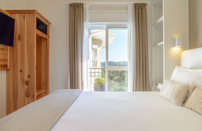 Pousada La Bas Suites de Montagne - Foto 2