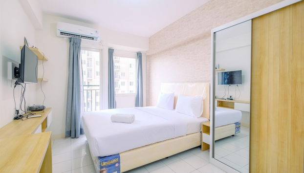 Nice and Warm Studio at Podomoro Golf View Apartment - Foto 4, Habitación