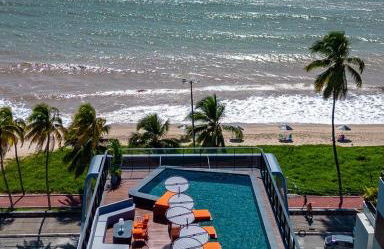 Viva hospedagens - Flat 009 beira mar com Varanda e piscina aquecida - Photo 1