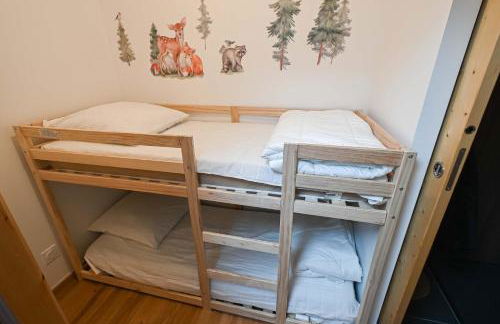 Dans résidence neuve LE SNOW ROC sur les pistes, appartement 8 personnes 2 chambres et coin montagne avec Terrasse WIFI et SAUNA - Photo 23