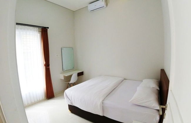 Omah Bondi Family Homestay by FH Stay - Foto 8