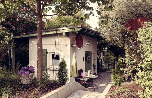 Ambiente Wohnen im Garten - Foto 1