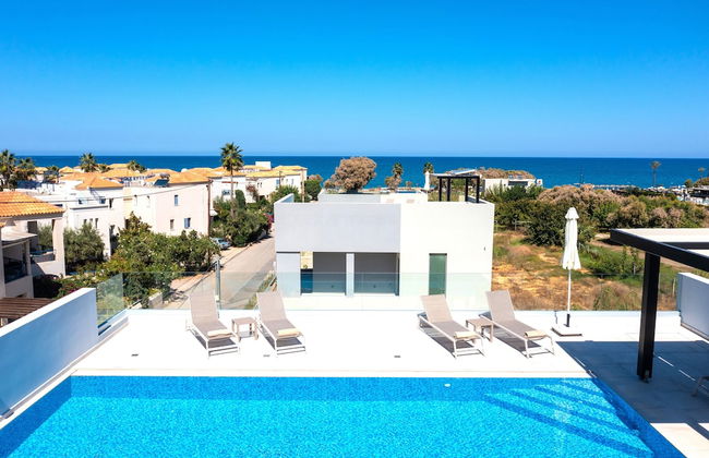 Beach Sand Villas - Beachfront Rooftop Pool - Photo 28