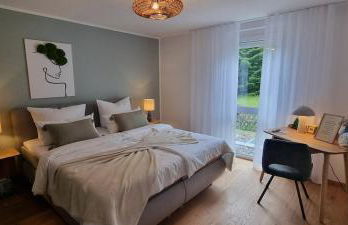 Waldgeflüster 2-Zi-DesignOase mit Terrasse und Tiefgarage im Neubau - Foto 11