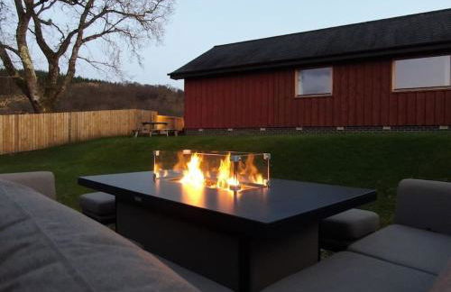 Hot tub lodge with stunning view - Foto 3