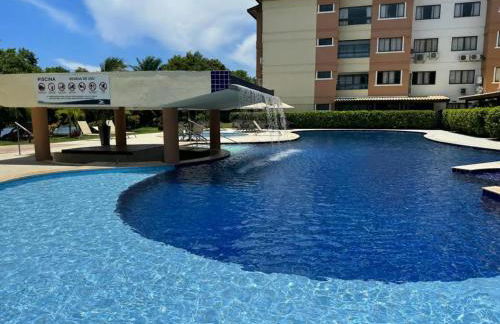 GUARAJUBA PARAÍSO DAS ÁGUAS - APT 2 quartos com AR e TV em TODOS os cômodos - Incluso Roupa de CAMA e BANHO - Filtro de Água Gelada e Maquina de Lavar dentro do APT - TOTAL CONFORTO PARA VC E SUA FAMILIA - Cond A beira da Lagoa e perto da PRAIA - Foto 4