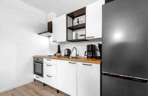 Exklusives Studio - Zentral Innenstadtlage - Kostenloser Parkplatz - Aufzug - Modern für bis zu 4 Personen - Smart Home - Foto 19