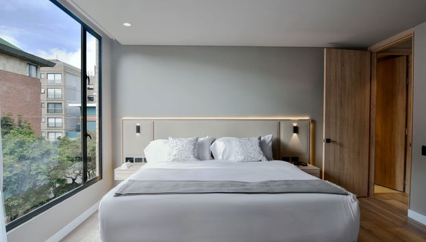 w Cozy 1BR w/ Brilliant Balcony in Unicentro - Foto 2, Habitación