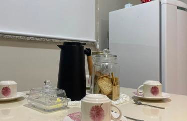 Apartamento em Poços - Varanda com Churrasqueira - Foto 9