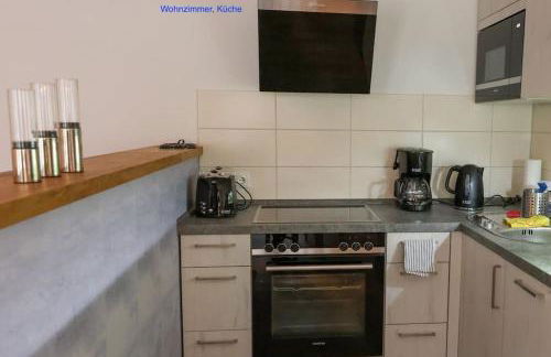 Freundliche Wohnung mit Parkplatz und Terrasse - Foto 14