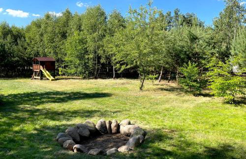 Sosnowy Raj domki nad rzeką Wkrą - Foto 61