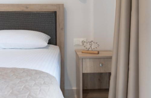 Sunshine Rooms and Suites - Foto 10