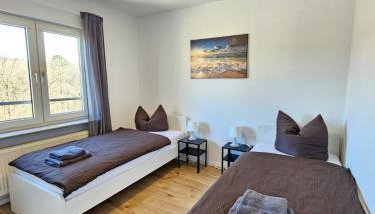 MR Living I modernes Apartment mit Einzelbetten, voll ausgestattete Küche, Balkon, WLAN, Parkplatz, ideal für Monteure I GI03 I GI02 - Foto 2