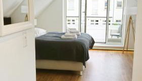 LIGHTHOUSE HOMES - moderne Ferienwohnungen mit Terrasse am Kirchenplatz - Foto 2