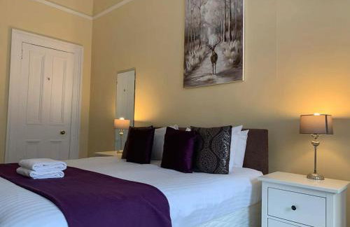 JOIVY Adorable 1 Bed Flat Near West End - Photo 13