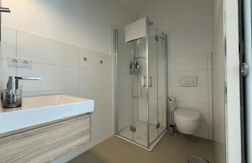 Ruhige Apartments mit guter Bahnanbindung und Küchennutzung - Foto 14