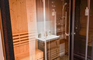 Jacuzzi privé, Sauna & Design Chic - Foto 10