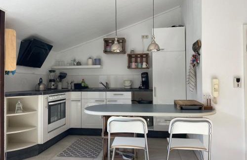 Dachwohnung mit Blick auf den Wagenberg - Foto 13