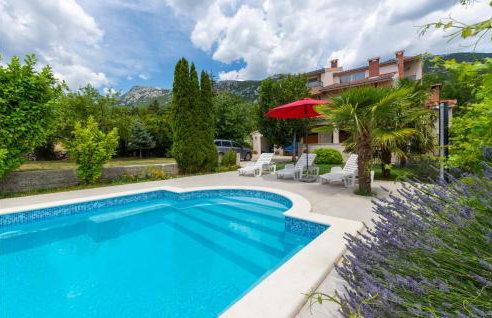 Three-Bedroom Apartment In Ostrvica - Photo 10