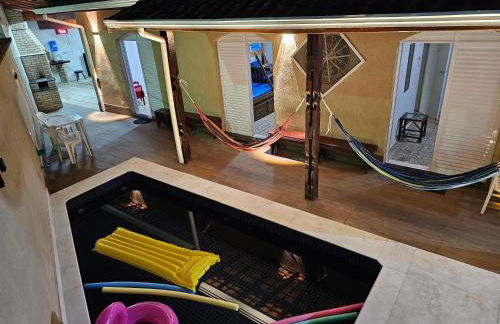 Casa Lindíssima e Espaçosa com 2 Piscinas - Adulto e Infantil, Perto da Praia, Opção da Piscina Adulto Aquecida Cobrado à Parte, 4 Quartos Frente as Piscinas, Área Gourmet Completa com Churrasqueira, Forno e Fogão a Lenha, Mesa de Bilhar, Lareira na Sala - Photo 44