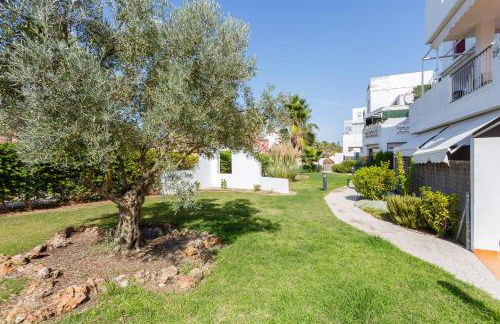 Bonito apartamento en campo de golf con piscina - Photo 21