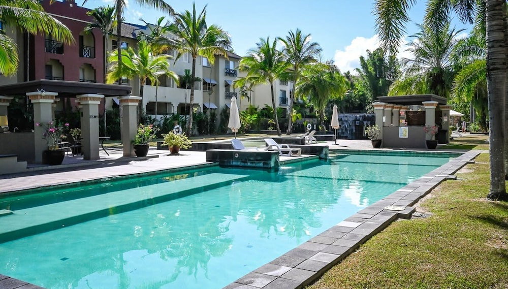 Lux Cairns - 9 Pools BBQ and Gym - Foto 1, Habitación