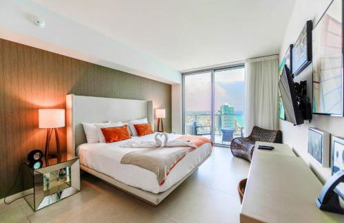 Ocean & City Views l Luxury Beachfront Condo - Photo 4