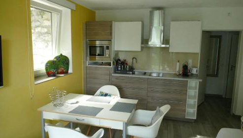 Gemütliches Garten-Apartment mit Bergblick - Foto 5, stove