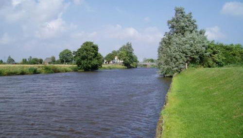 Windmühle am Fluss in Altfunnixsiel - Foto 4