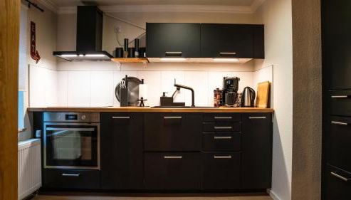 Ferienwohnung in Stadtmitte Hoya - Foto 3, stove