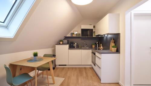 BG Living & Hosting - Hochwertige Ferienwohnung im Zentrum von Wittlich - 3 Gäste, WLAN & Waschmaschine - Foto 5, stove