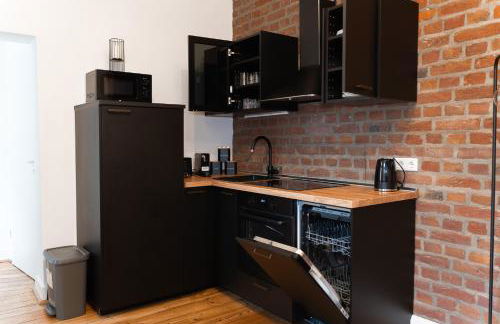 JUNIK Apartments - Deine Cityapartments in Duisburg - Photo 13