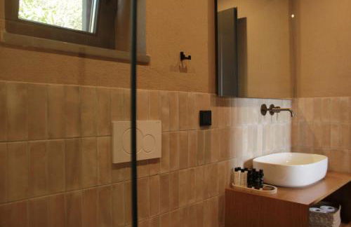 Lithero Suites - Photo 32