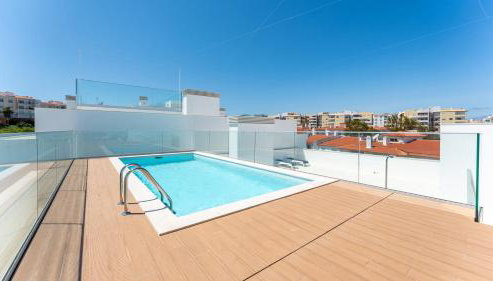 Modern 2BR w Rooftop Pool & Parking by LovelyStay - Foto 4
