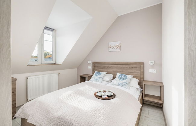 Nadbrzeżna Apartament by Renters - Photo 1