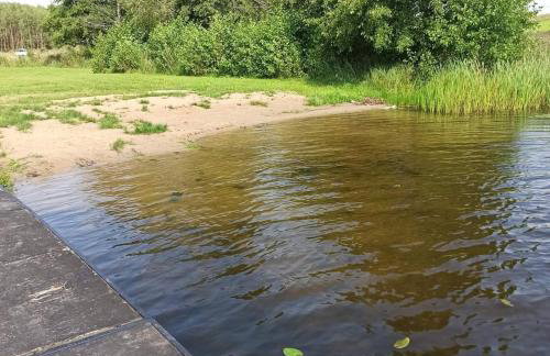 Między Olchami domek nad jeziorem. Noclegi całoroczne. Cisza, spokój. - Foto 30