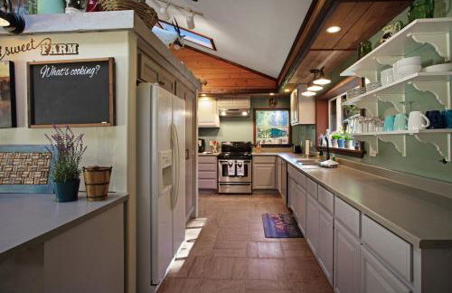 Tree-lined Home with Hot Tub Firepit & Large Yard - Photo 11