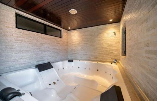 Atalaia SPA 1 Qto c/ Banheira by Achei Camboriú - Foto 1