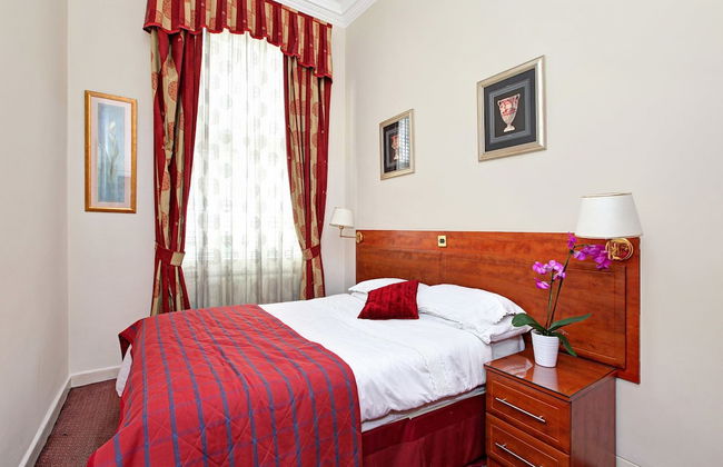 Baker Street Suites - Photo 13