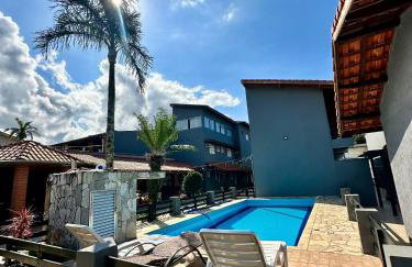 POUSADA OHANA, SUITES ao LADO DO SESC BERTIOGA, e PROXIMO A PRAIA - Foto 1