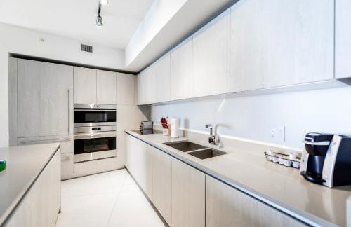 Ocean & City Views l Luxury Beachfront Condo - Photo 28