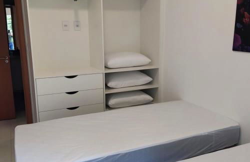 Apartamento novo a 350 m da praia das Toninhas em Ubatuba - 2 dormitórios sendo 1 suite, piscina, varanda gourmet com churrasqueira, ar condicionado, cozinha completa, garagem privativa - Foto 8