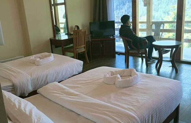 Whispering Woods Resort - Foto 2