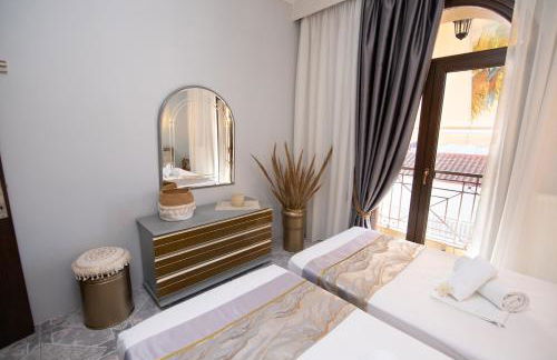 Sunrise Suite Olympiada - Luxury Beachfront Escape - Photo 25