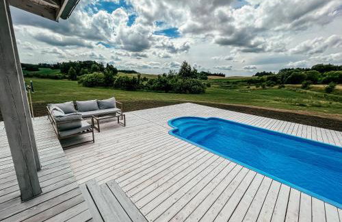 Sielski dom z basenem w Rydzewie - Foto 4