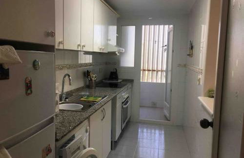 Apartamento segunda línea de playa con piscina - Photo 17