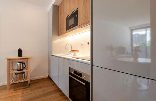 Sleek & Modern Flat w/ Private Garage by HostWise - Photo 22