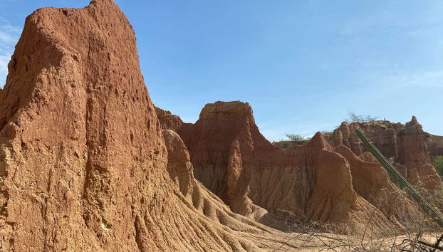 Wander along a winding path surrounded by dunes